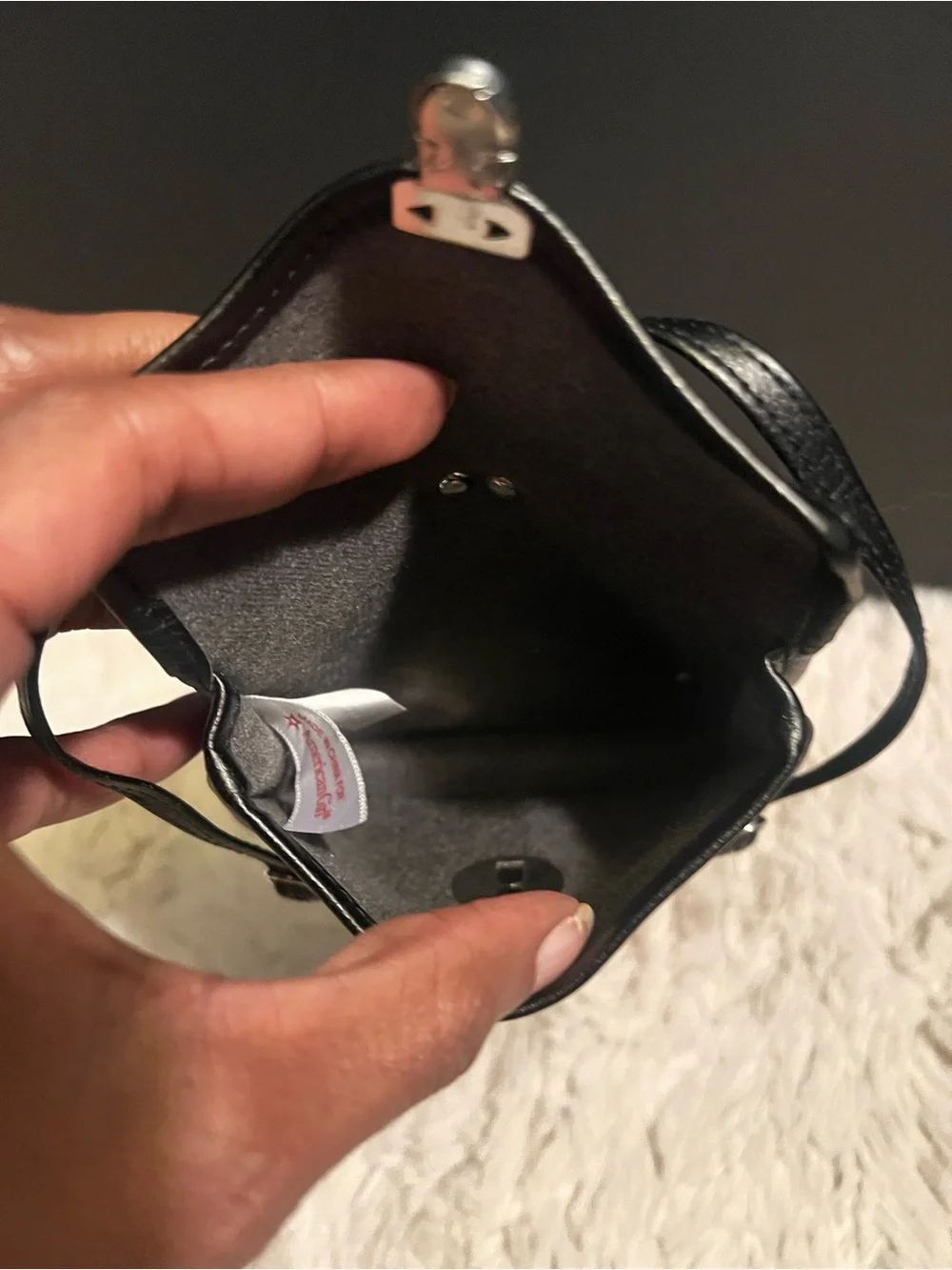 Three piece bundle of two coin, purses, and one small wallet